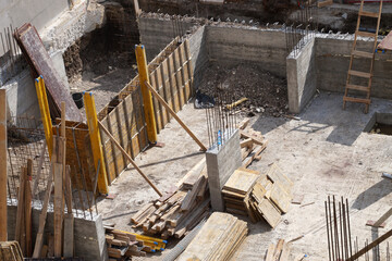 Monolithic construction. Installation of load-bearing wall formwork for concrete pouring. Top view