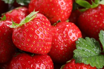 Fresh ripe strawberries as background, closeup view