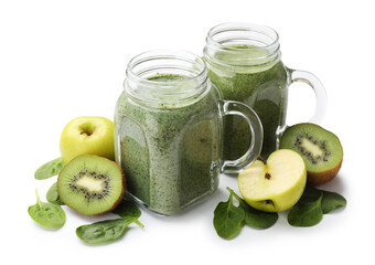 Tasty smoothie in mason jars, spinach leaves, apples and kiwi isolated on white