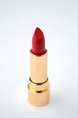 Red Lipstick with Gold Accents on Clean White Background