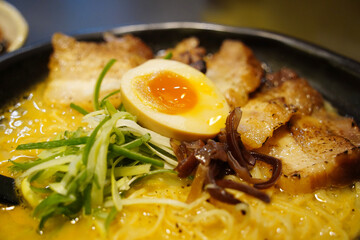 Close-up of Japanese Ramen with Soft-Boiled Egg, Chashu Pork, and Vegetables
