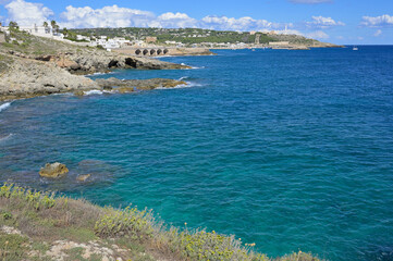 View from Punta Ristola over turquoise sea to Santa Maria di Leuca. Apulia, Italy.