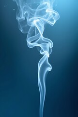 Obraz premium Wispy blue smoke swirling upwards against a dark blue background image