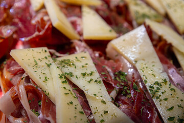 Spanish cheese and Serrano ham. Snack food.