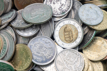 Collection of old coins from different countries. Old money in the form of coins.