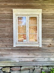rustic wooden window frame with a weathered appearance. Finland, 19th century