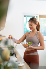 Nutrition Focus: Young Woman Making Healthy Smoothie at Home