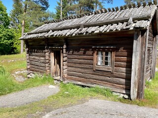 Old dilapidated ancient wooden house in the village. Finland, 19th century
