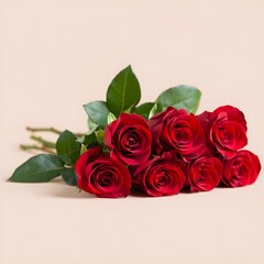 Obraz premium A beautiful bouquet of seven deep red roses with green leaves on a soft beige background