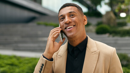 Happy smiling positive African American male entrepreneur employer manager employer guy business...
