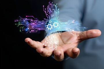 Hand holding glowing digital circuit board with gears symbolizing technology and innovation
