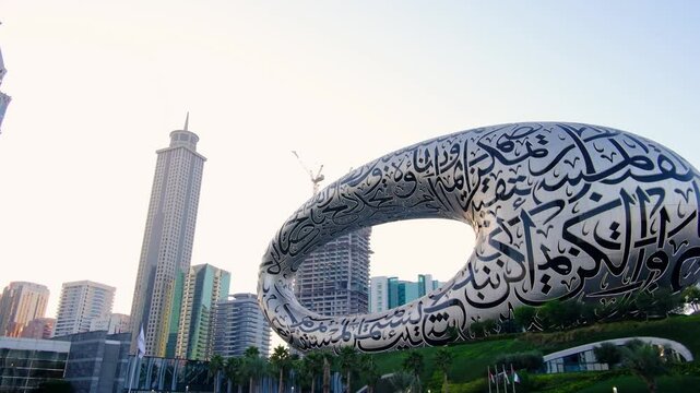 Dubai, UAE - January 16, 2024: Dubai museum of the Future view from downtown . Modern futuristic Museum built according designed by architect Shaun Killa. Cityscape skyline.