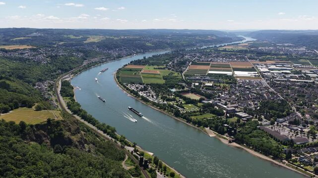 rhine river, at Remagen, shipping and transport. Inland river. Aerial drone video in Germany.