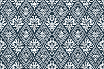 This pattern features intricate white floral motifs arranged in diamond-shaped frames on a dark blue background, combining elegance with a traditional Thai ornamental style.