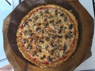 Homemade Cauliflower Pizza Crust with Mushrooms, Sauce, and Cheese