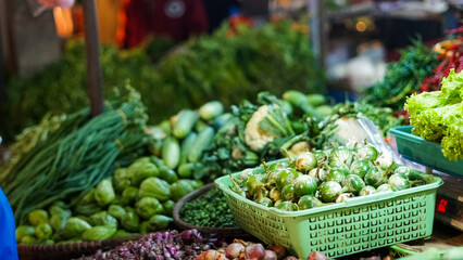 Vibrant Green Vegetables at a bustling Asian Market