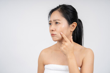 Asian woman with skin problems on her face