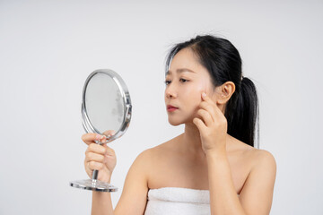 Asian woman with acne on her face