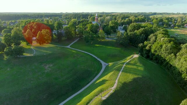 Aerial view of Kernave Archaeological site, a medieval capital of the Grand Duchy of Lithuania, UNESCO World Heritage Site. Reconstructed medieval village. Annual Festival of Experimental Archaeology.