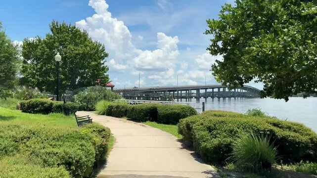 Biking along the St Johns River waterfront near historic downtown Palatka in Putnam County, Florida. 