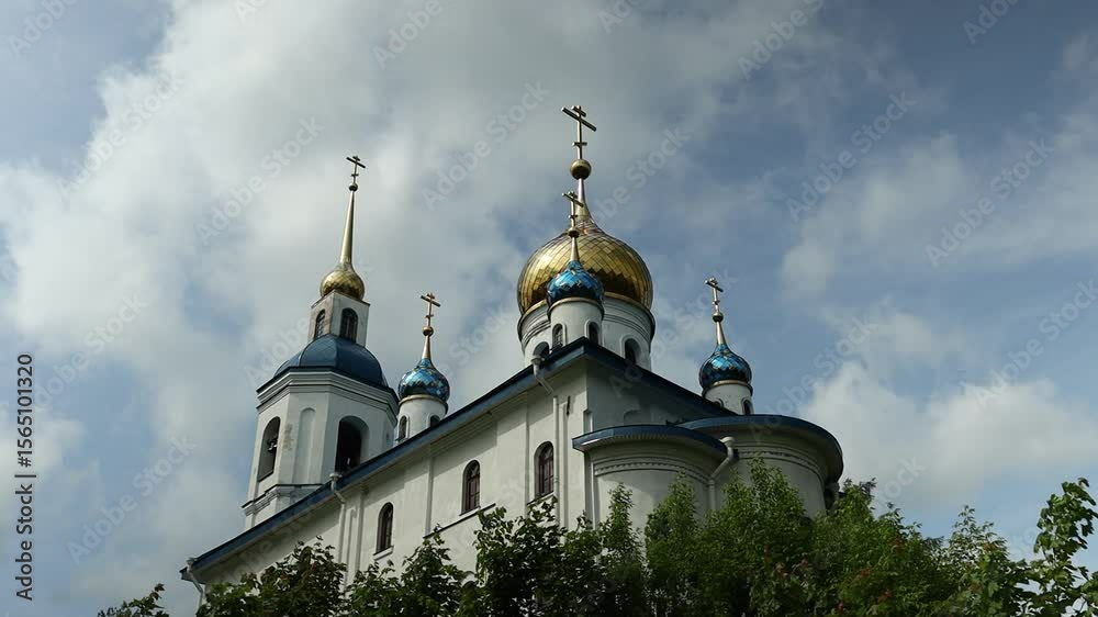 Poster A large white building with a distinctive golden dome, suitable for use in architectural or cityscape contexts