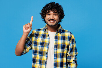 Young smart proactive Indian man he wear yellow checkered shirt casual clothes holding index finger...