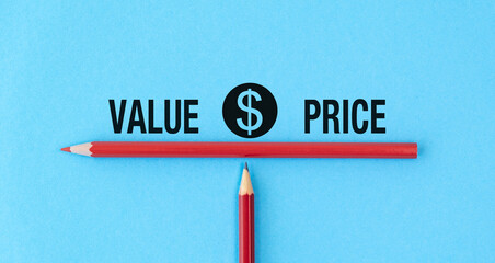 A red pencil is on a blue background with the words Value Price written below it