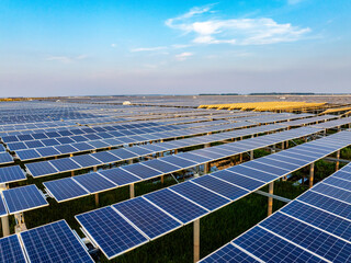 Solar photovoltaic power plant at sunset