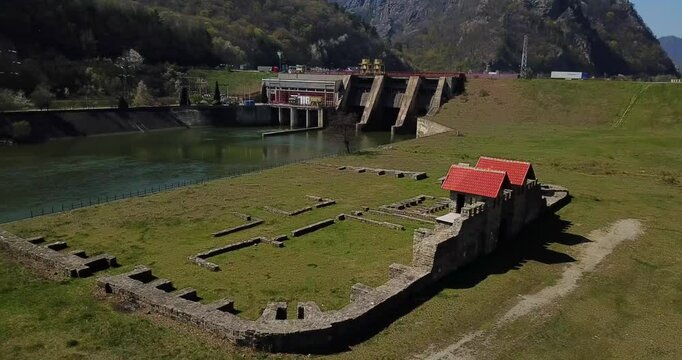 Drone shot of Arutela Roman Castrum, Hidrocentrala Turnu power plant and Barajul Turnu weir, Romania