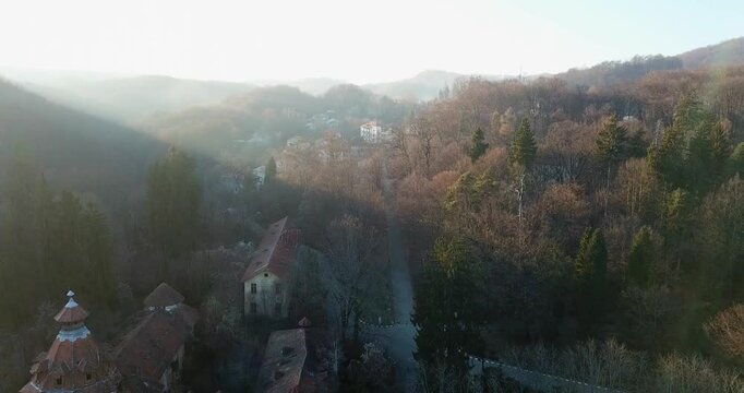 Aerial footage of the Sanatoriul Baile Govora Nursing home in Baile Govora, Romania at sunset