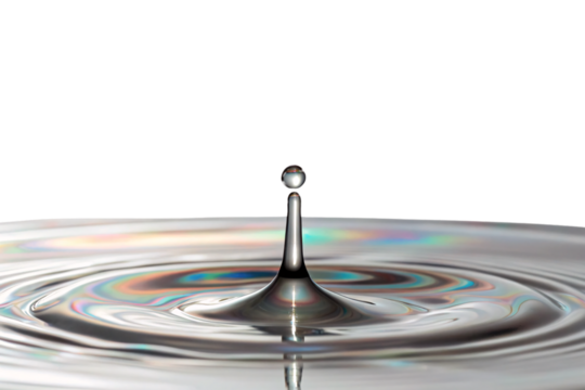 Perfect water droplet creating concentric ripples with iridescent rainbow reflections on pristine liquid surface below, isolated on a transparent background