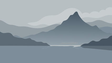 Panoramic mountain landscape at sunrise, with a serene blue sky and mist-shrouded peaks reflected in the tranquil water