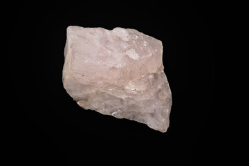 Pink rose quartz crystal isolated on a black background. 