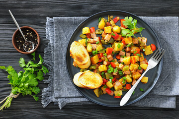 crispy fried cubed potatoes with ham, bell peppers