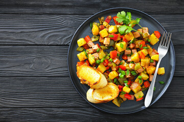 crispy fried cubed potatoes with ham, bell peppers