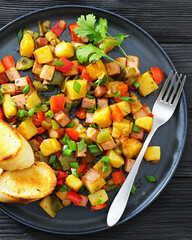 crispy fried cubed potatoes with ham, bell peppers