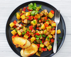 crispy fried cubed potatoes with ham, bell peppers