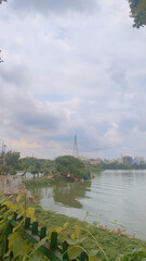 Scenic view of a lake under a cloudy sky