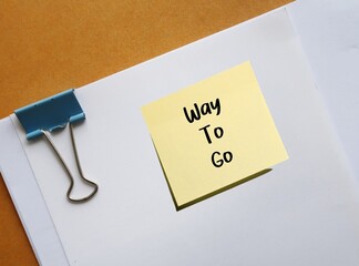 Document with compliment note written WAY TO GO -  to tell someone that he or she has done well - express approval with job they has done and their effort or accomplishment - good job or well done