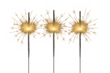 Burning sparklers releasing golden sparks against transparent backdrop, festive celebration element for graphic projects