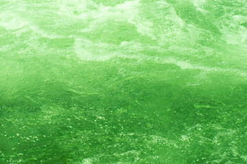 Blue water with ripples on the surface. Defocus blurred transparent blue colored clear calm water...