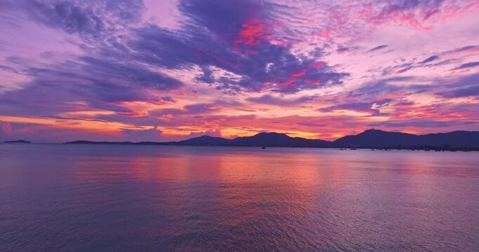 aerial view sweet colorful sky in sunset above the mangrove trees.
Majestic sunset or sunrise landscape Amazing light of nature background. 
gradient color texture fantastic sky texture.