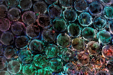 Absract background of shiny plastic and bubbles dreating bright sci-fi style texture background