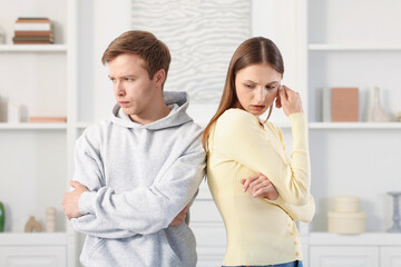 Fototapeta premium Woman and man having fight at home