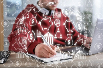 Man working on laptop at table, closeup. Virtual icons