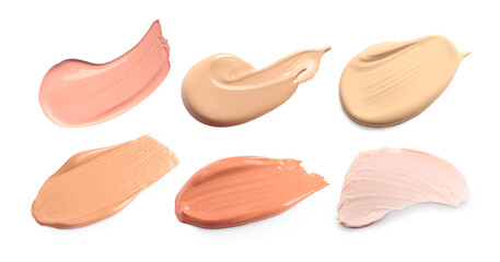 Smears of liquid foundation on white background, set. Palette of shades