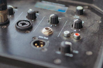 button on the back of the speaker