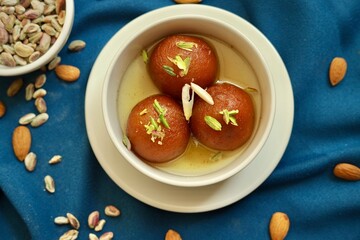 gulab jamun sweet spongy fried indian dessert stacked 