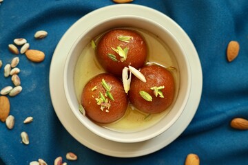gulab jamun sweet spongy fried indian dessert stacked 