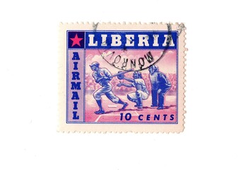 A vintage postage stamp from Liberia isolated on a white background.